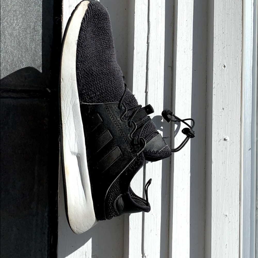 Black and white Adidas sneakers